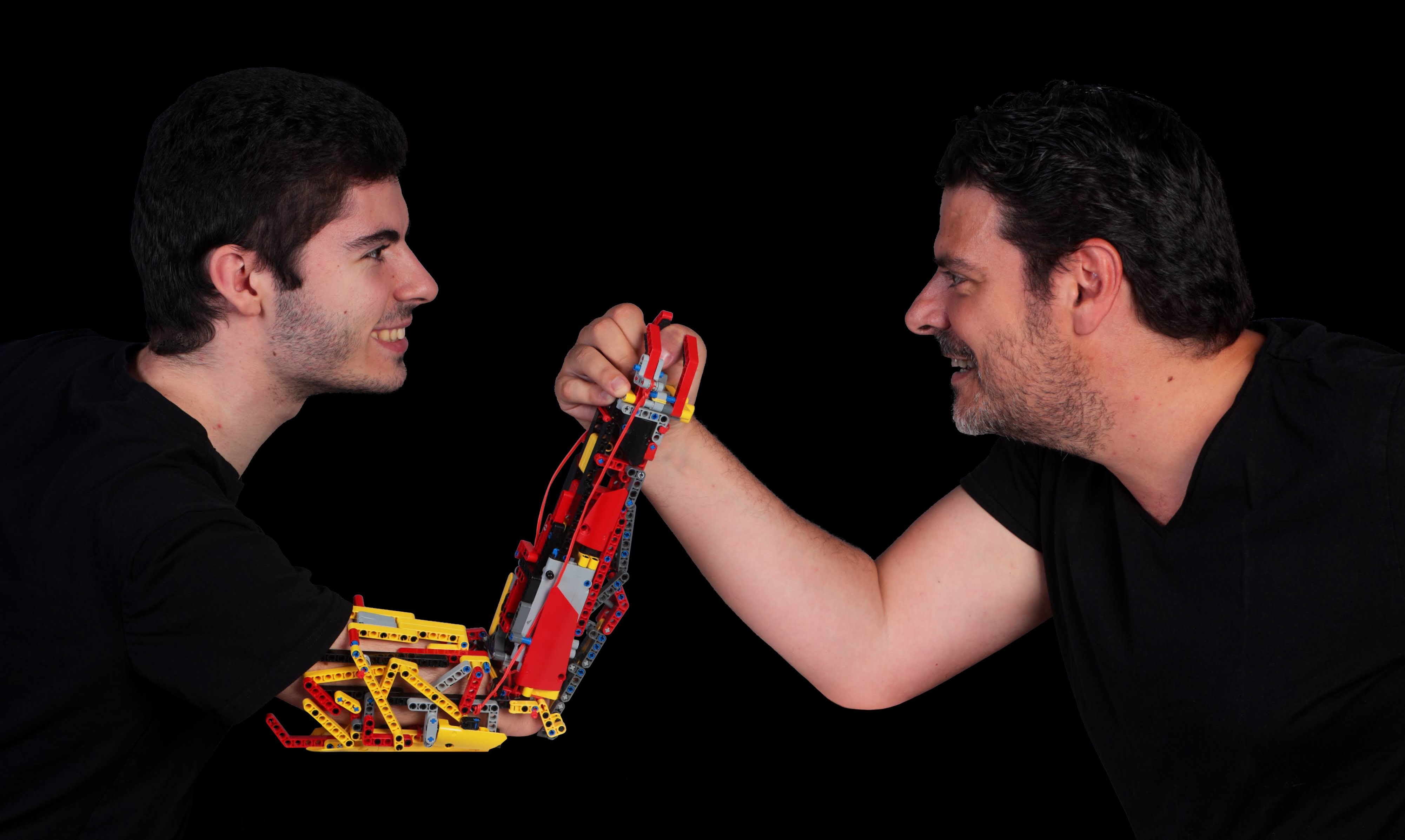 Father and son arm wrestling